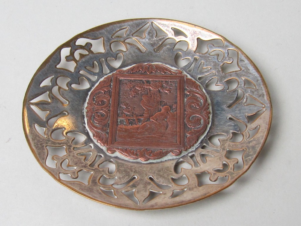 Appraisal: White metal dish mounted with a copper pictorial plaque