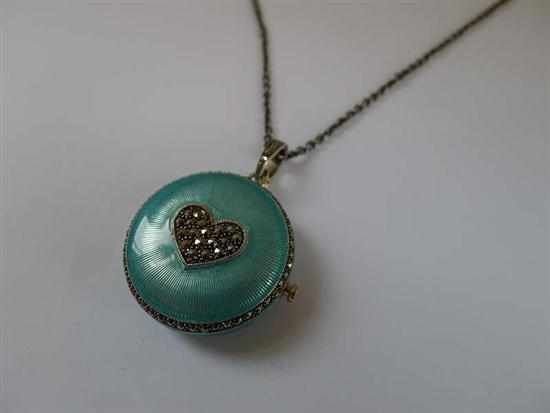 Appraisal: A MARCASITE AND ENAMEL PENDANT LOCKET