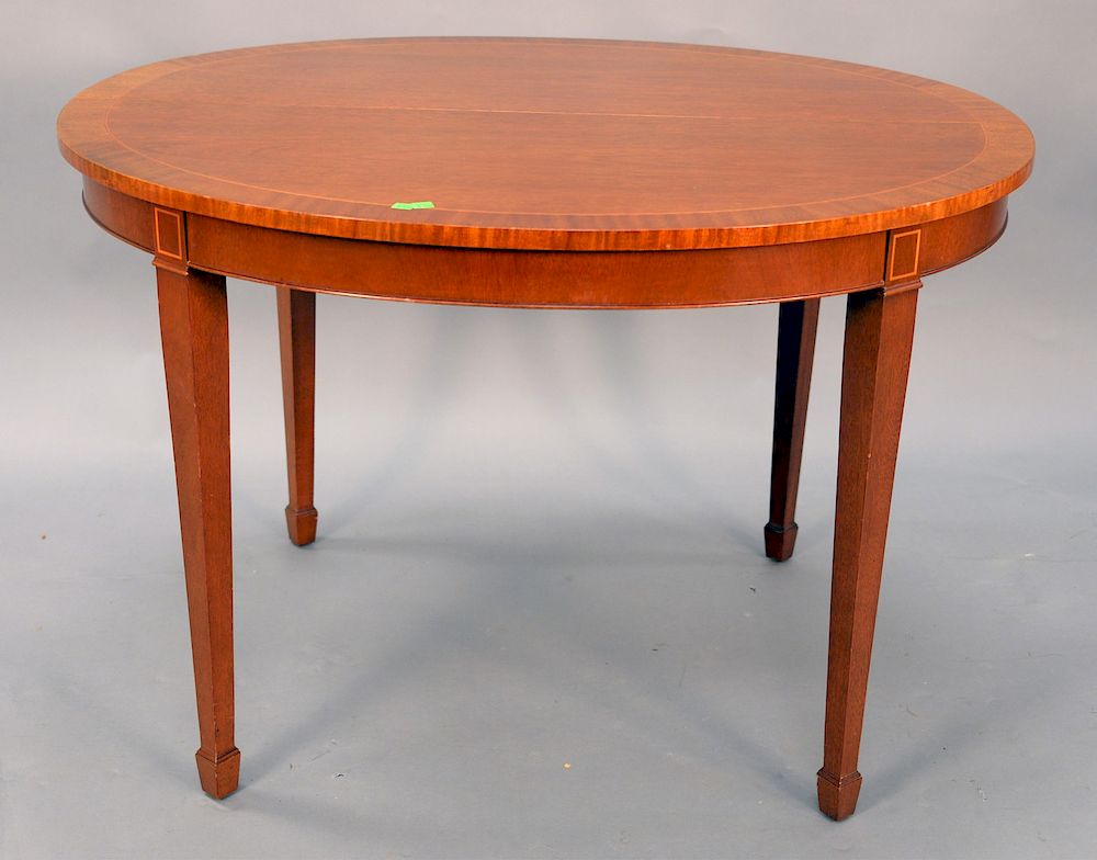 Appraisal: Kindel oval mahogany extending table x with three extra leaves