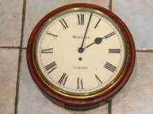 Appraisal: A mahogany cased wall clock with eight day fusee movement