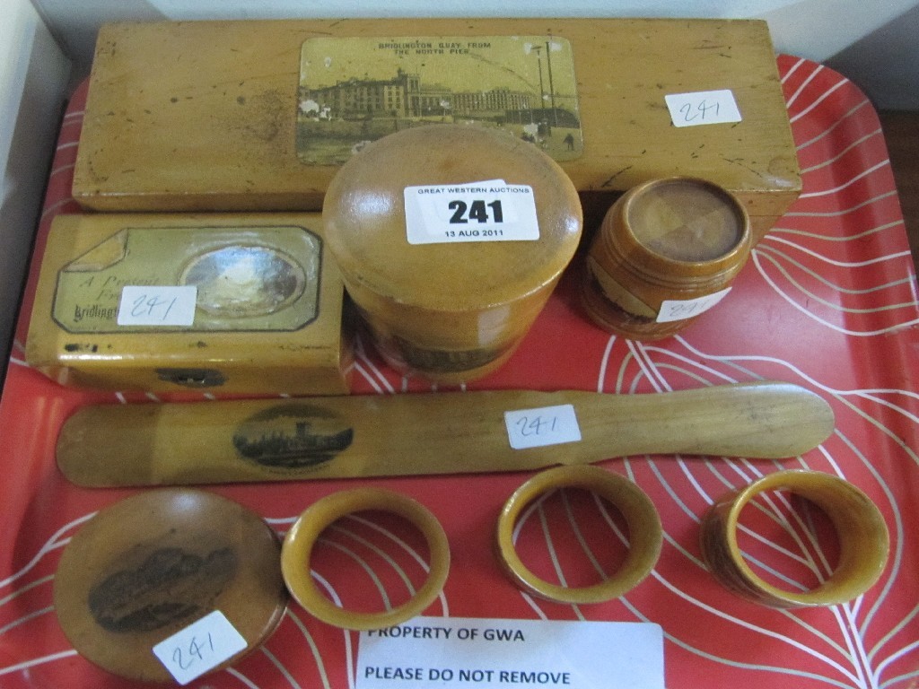 Appraisal: Lot comprising nine pieces of Mauchline ware - napkin rings