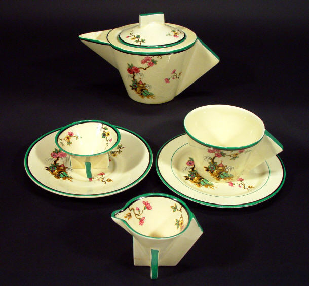 Appraisal: Clarice Cliff honey glaze teaset decorated with 'Dora Rose' pattern