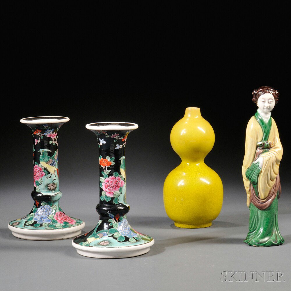 Appraisal: Group of Porcelain Items Asia a sancai-glazed figure of a