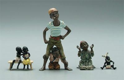 Appraisal: Miniature bronzes black figures painted well cast bronze figures possibly