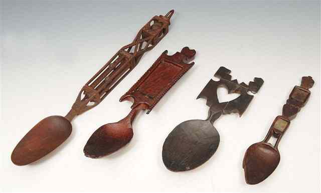 Appraisal: AN OLD WELSH LOVE SPOON with carved stylistic and mirrored