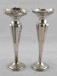 Appraisal: A pair of silver vases Sheffield ht cm