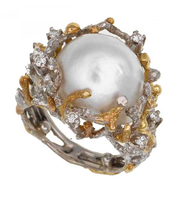 Appraisal: A BAROQUE PEARL AND DIAMOND RING mounted in yellow and