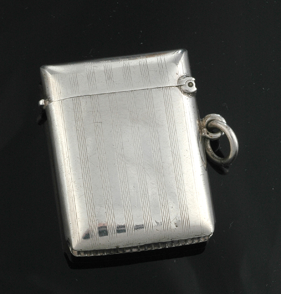 Appraisal: An antique silver vesta case The engine turned sterling silver