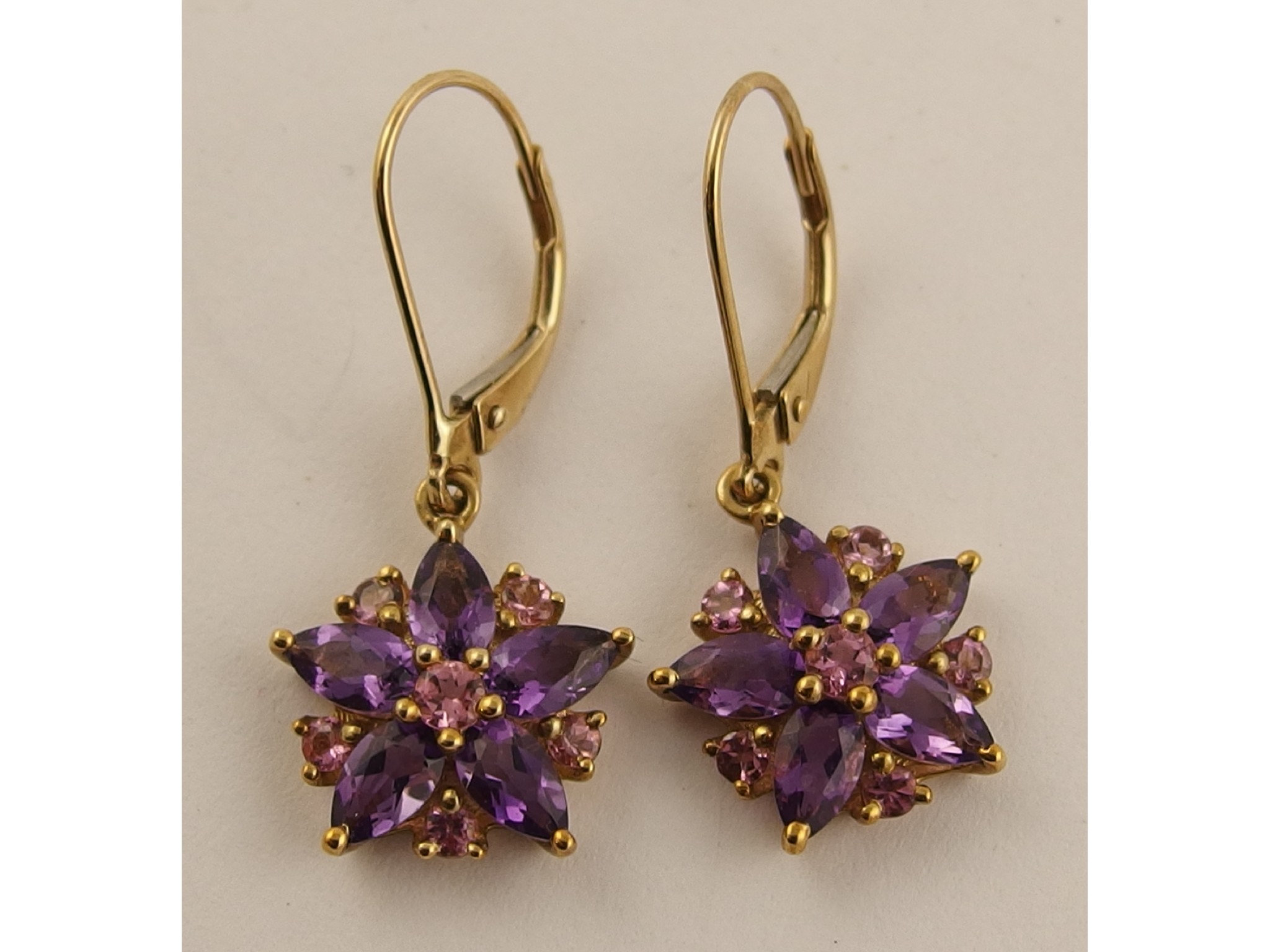 Appraisal: A pair of ct gem set flower earrings