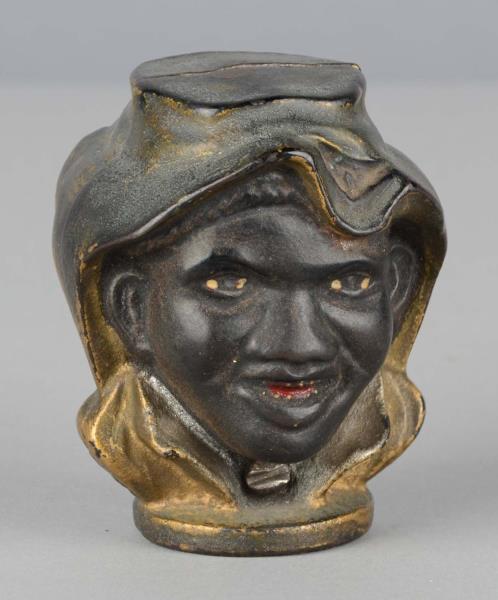 Appraisal: Figural Head Cast Iron Still Bank Bank has faces on