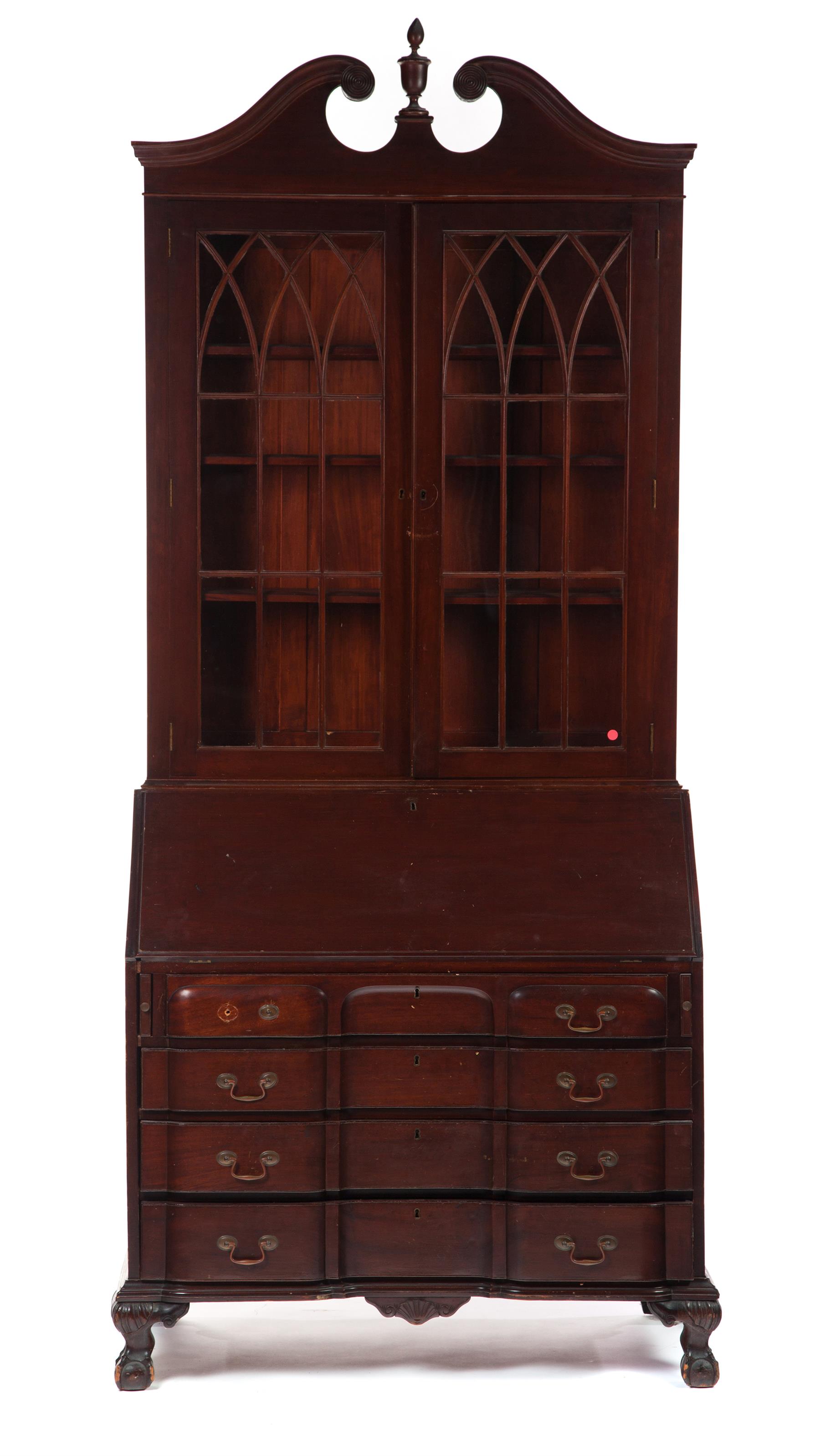 Appraisal: TWO-PIECE CHIPPENDALE-STYLE SECRETARY BOOKCASE American st quarter- th century Broken-arch