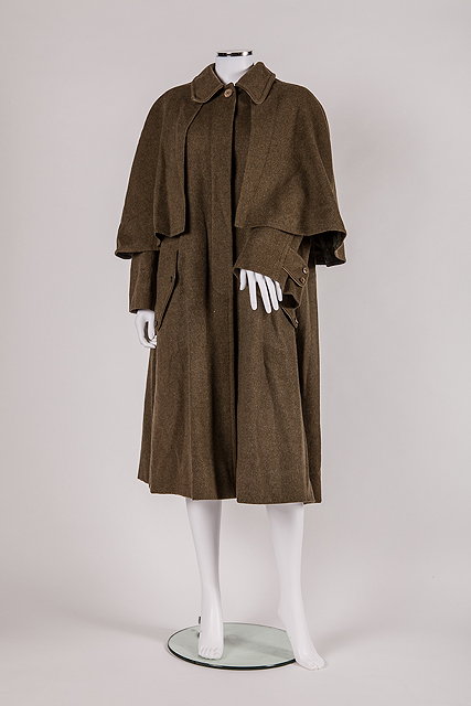 Appraisal: A mans s green Herm s coat made from wool