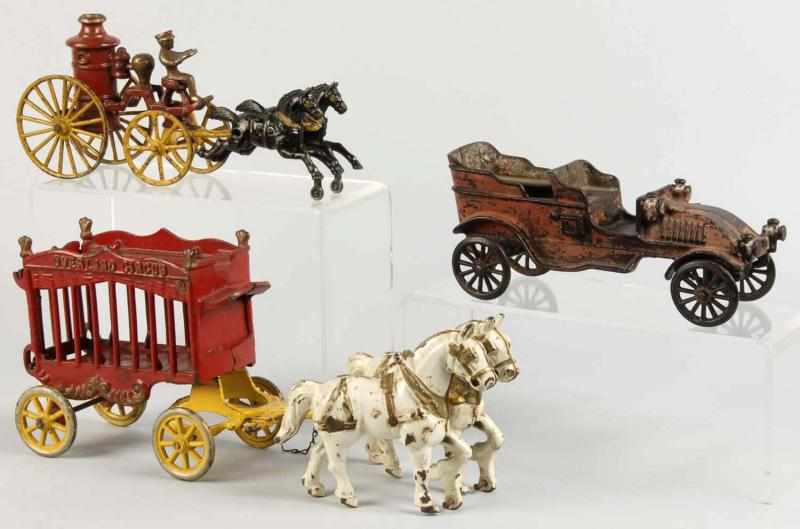 Appraisal: Lot of Cast Iron Vehicle Toys Description American Includes Kenton