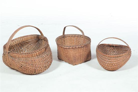 Appraisal: THREE BASKETS American early th century woven splint Two buttocks