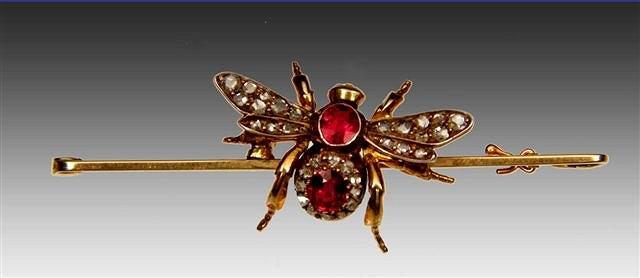 Appraisal: A VICTORIAN BUG BROOCH the bug set with two rubies