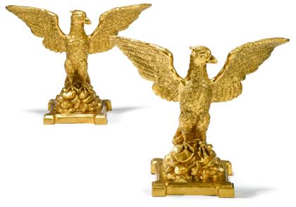 Appraisal: Pair of gilded cast iron eagle with outstretched wingsEach eagle