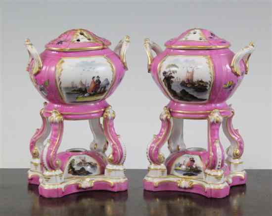 Appraisal: A pair of Berlin pastille burners and covers late th