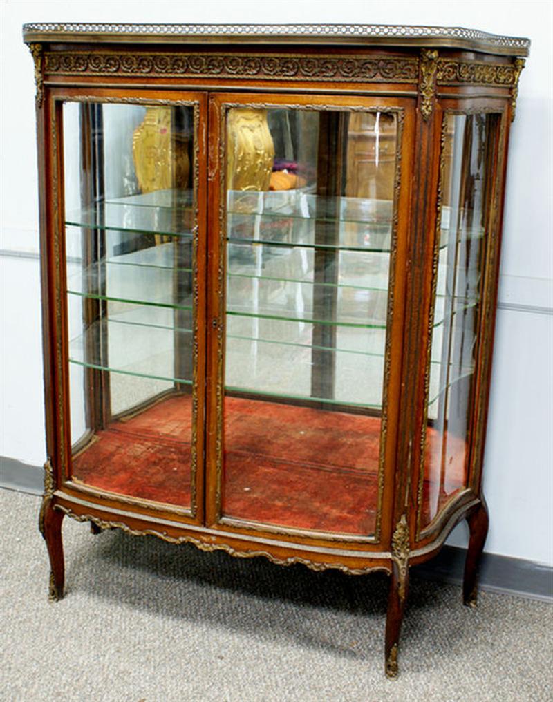 Appraisal: Mahogany ormulu mounted Louis XVI style display cabinet S shaped