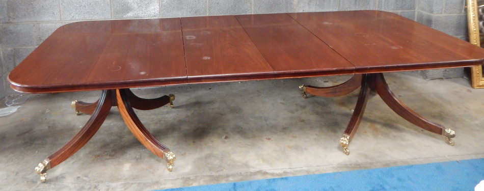 Appraisal: A Regency style mahogany twin pedestal extending dining table the