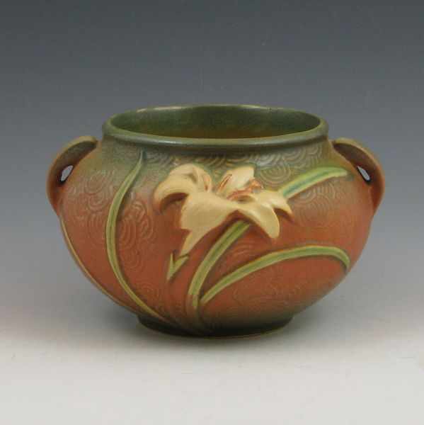 Appraisal: Roseville Zephyr Lily jardiniere in brown and green Marked Roseville