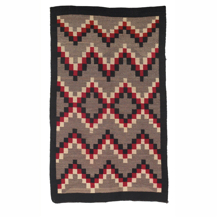 Appraisal: Navajo rug c geometric pattern in red brown and gray