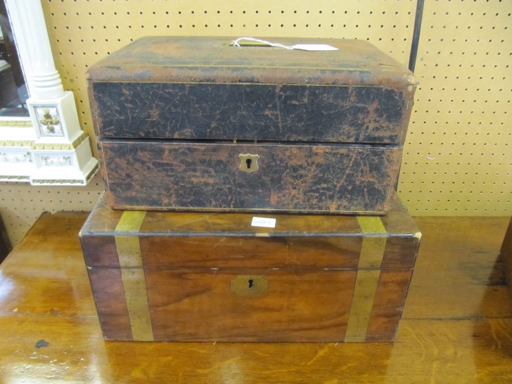 Appraisal: Leather tooled jewellery box and a Victorian lap desk