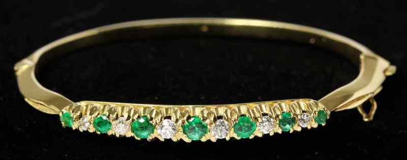 Appraisal: Emerald Diamond Bangle Braceletof hinged form and set with full