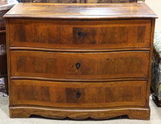 Appraisal: German chest th century having a serpentine top above three