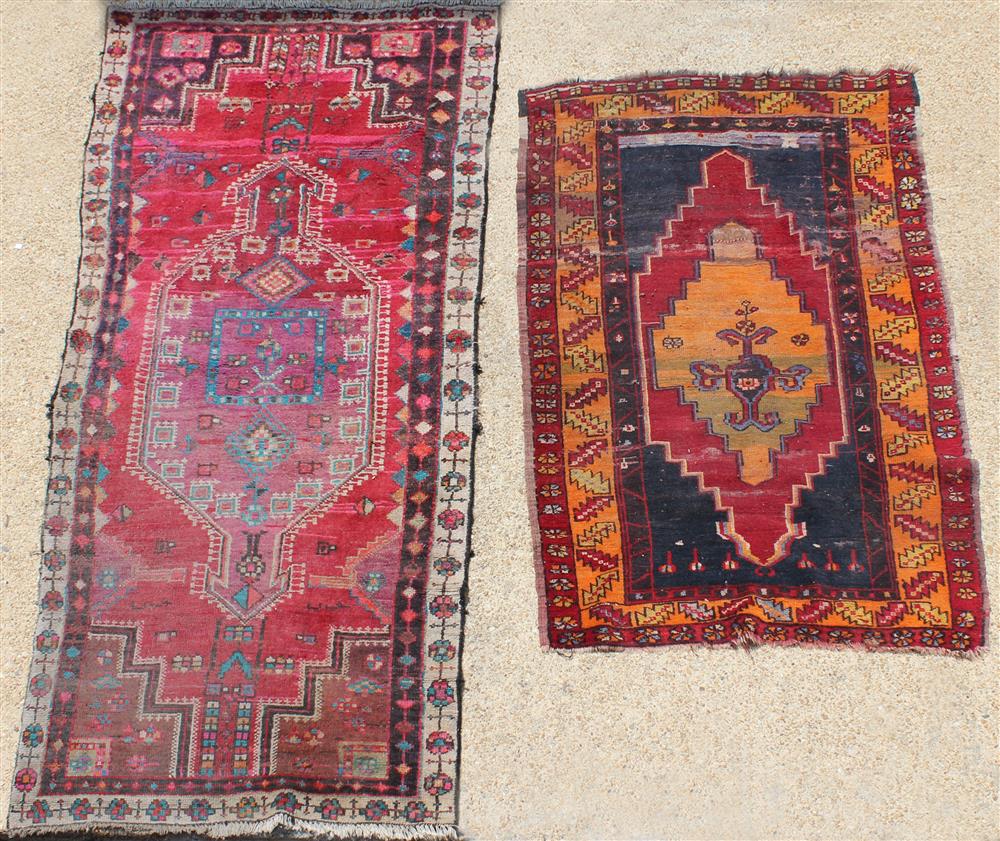 Appraisal: TWO TRIBAL OCTAGONAL MEDALLION WOOL RUGS the first with center