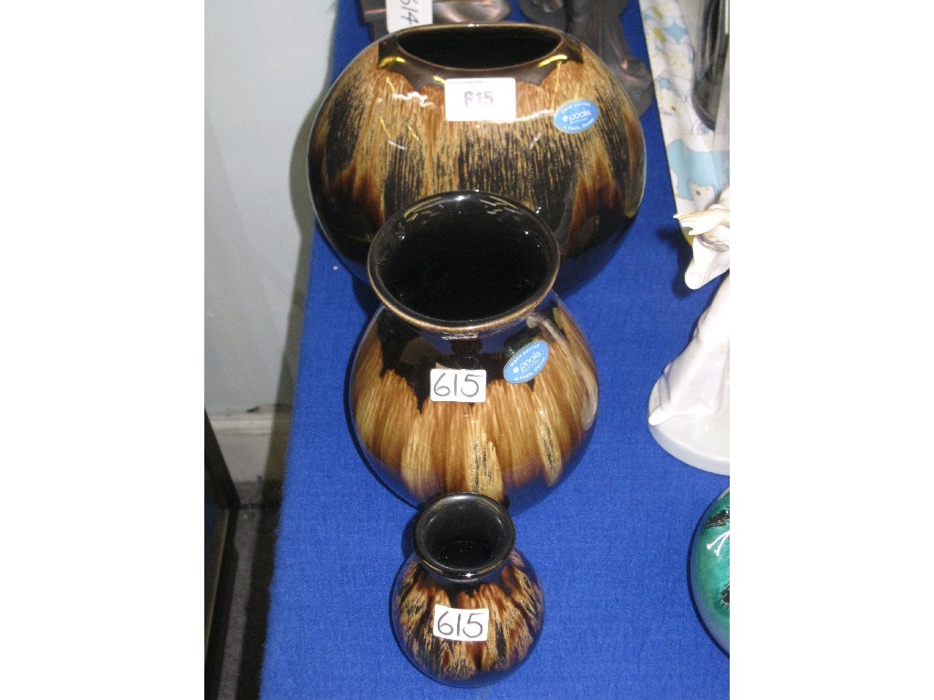 Appraisal: Three Poole pottery 'Precious' pattern vases