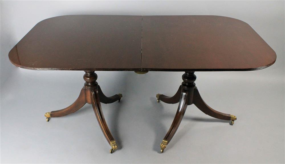 Appraisal: GEORGIAN STYLE MAHOGANY DINING TABLE having a rectangular top with