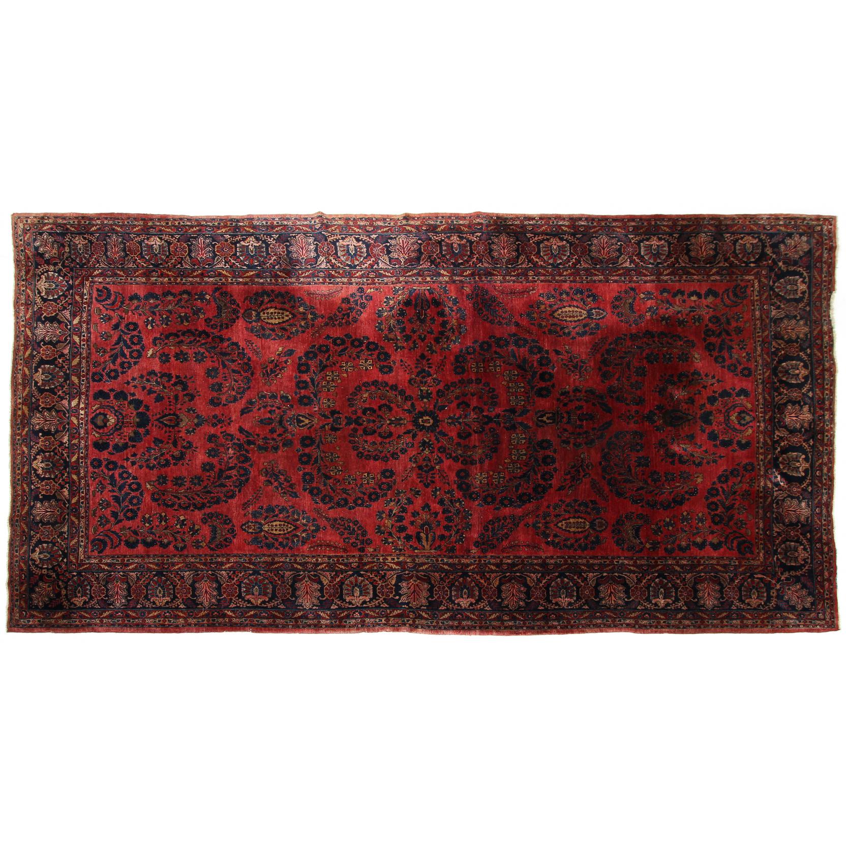 Appraisal: Persian Sarouk Carpet circa the wine field with blue and