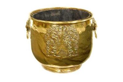 Appraisal: A brass jardiniere decorated with a coat of arms and