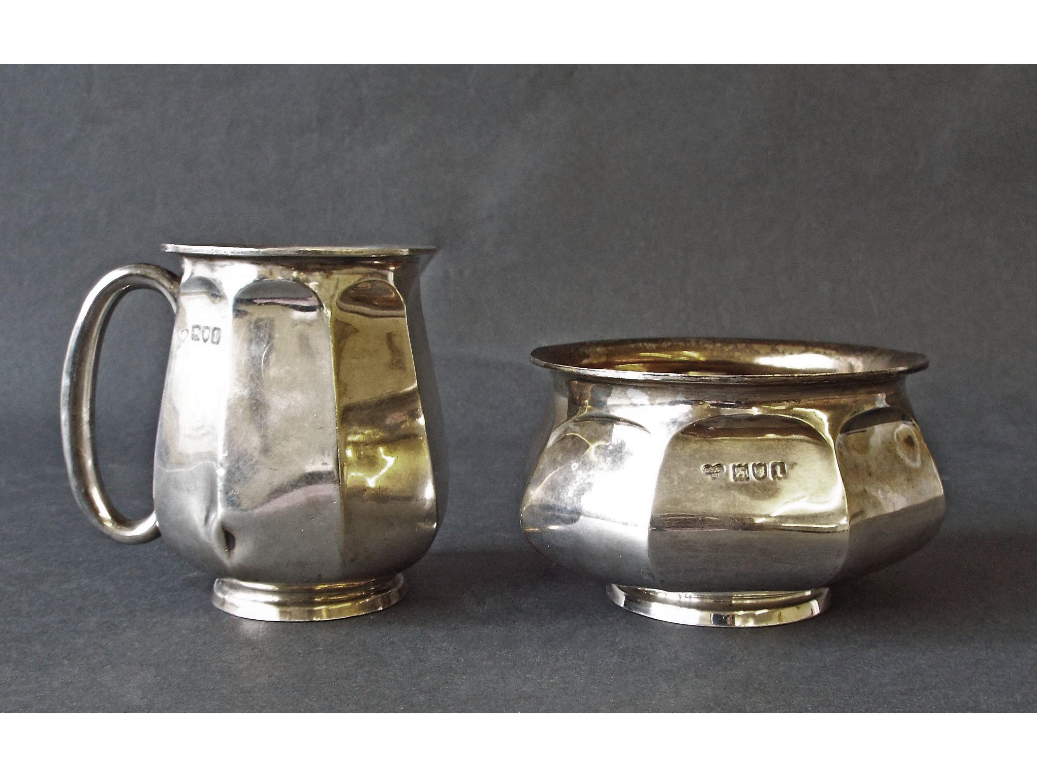 Appraisal: Edwardian silver faceted tankard and bowl set maker Goldsmiths Silversmiths