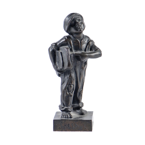 Appraisal: A German bronze sculpture of a ragged newspaper boy early