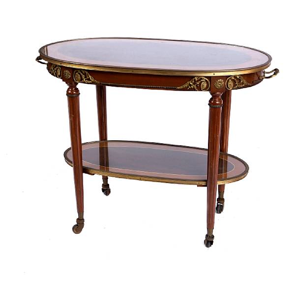 Appraisal: A Louis XVI style gilt metal mounted two tier tea