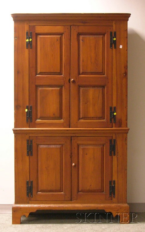 Appraisal: Pine Cupboard with Four Paneled Doors the interior with fixed