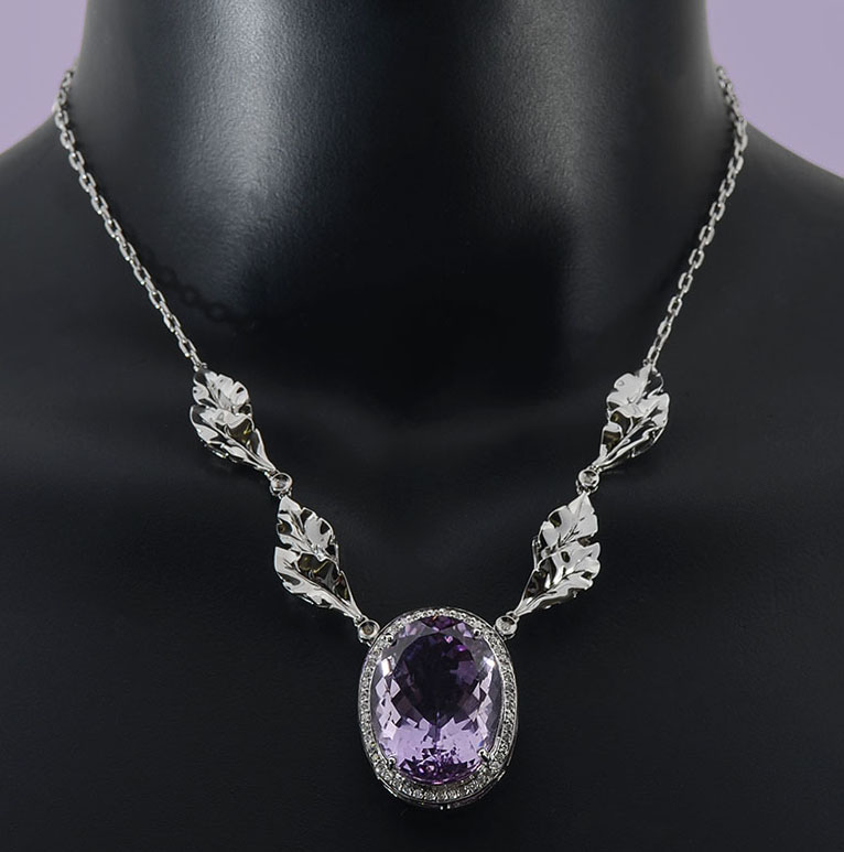 Appraisal: CT AMETHYST K WHITE GOLD NECKLACE WITH DIAMONDS Oval amethyst