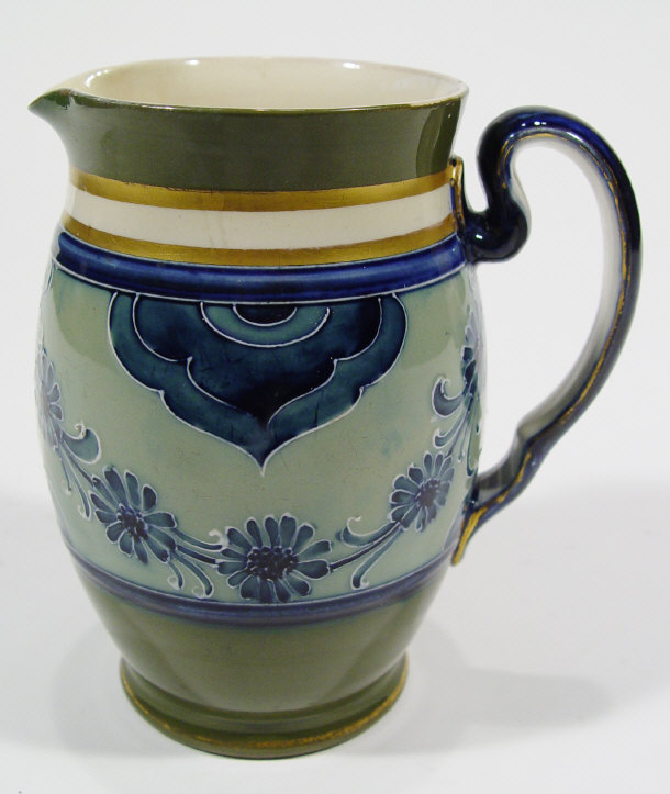 Appraisal: Moorcroft McIntyre pottery jug hand painted and tubelined with blue