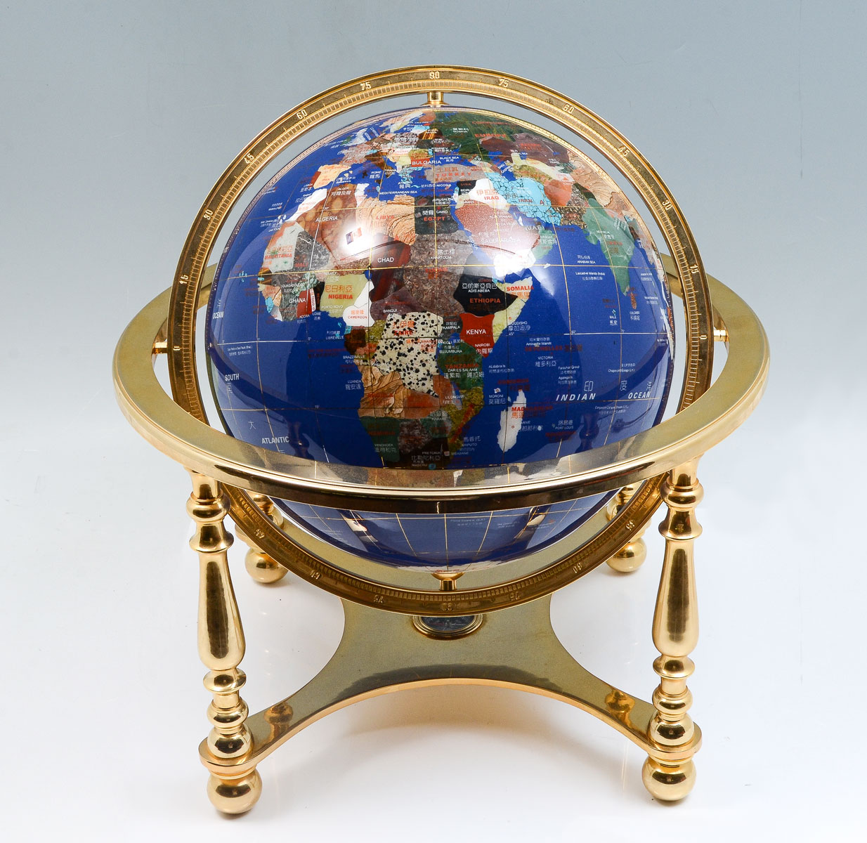 Appraisal: INLAID LAPIS SEMI-PRECIOUS STONE GLOBE A lapis lazuli terrestrial globe