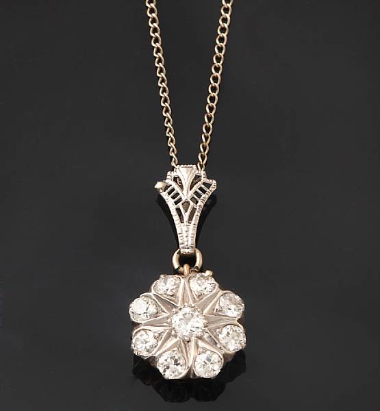 Appraisal: A diamond and k white gold pendant with silver chain