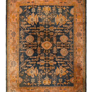 Appraisal: An Oushak Wool Rug Late th Century feet inches x