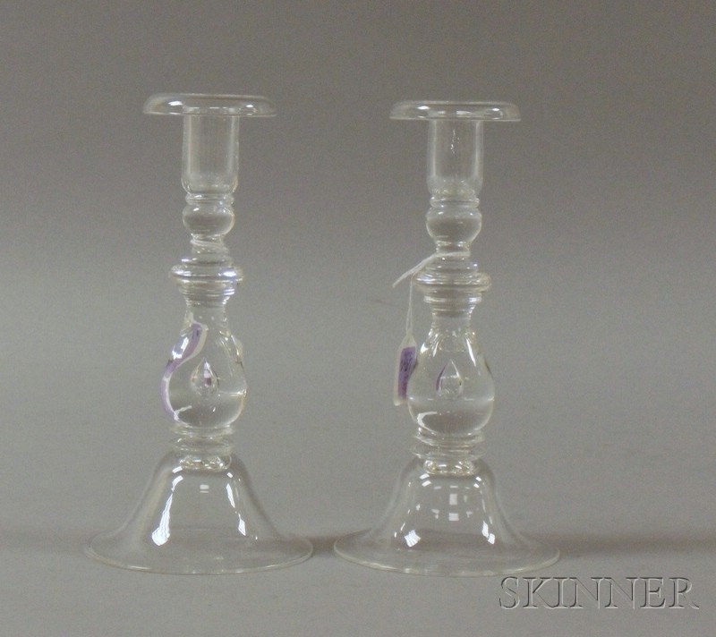 Appraisal: Pair of Steuben Colorless Glass Candlesticks with trapped teardrop-shaped bubble