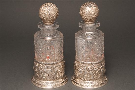 Appraisal: Pair of American repousse silver and cut glass bottles and