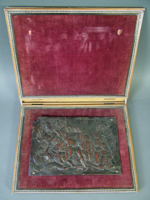 Appraisal: A th century bronze rectangular plaque depicting an erotic figure