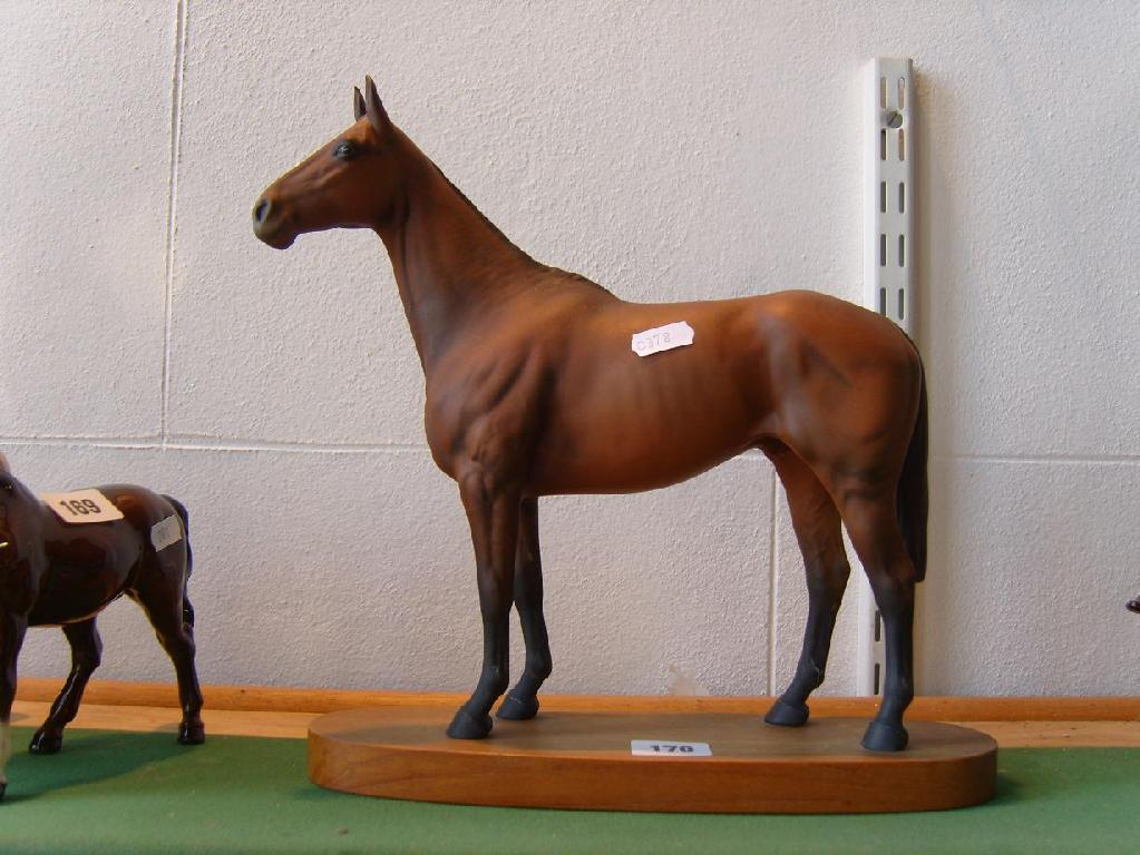 Appraisal: A Beswick matt glazed model of Arkle champion steeplechaser raised