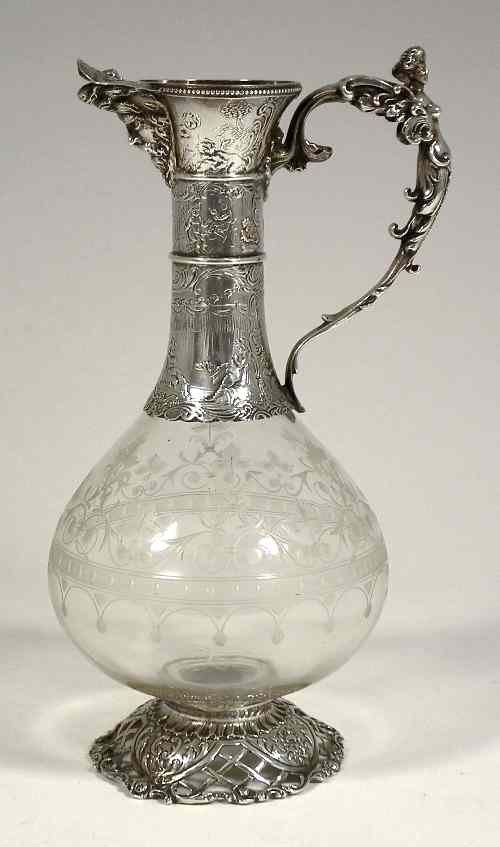 Appraisal: A th Century Continental etched glass liqueur decanter with silver