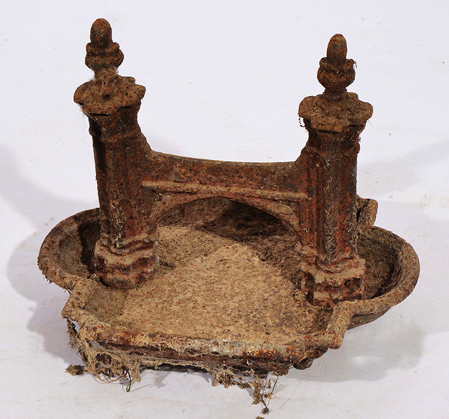 Appraisal: A VICTORIAN CAST IRON BOOT SCRAPER of gothic revival form