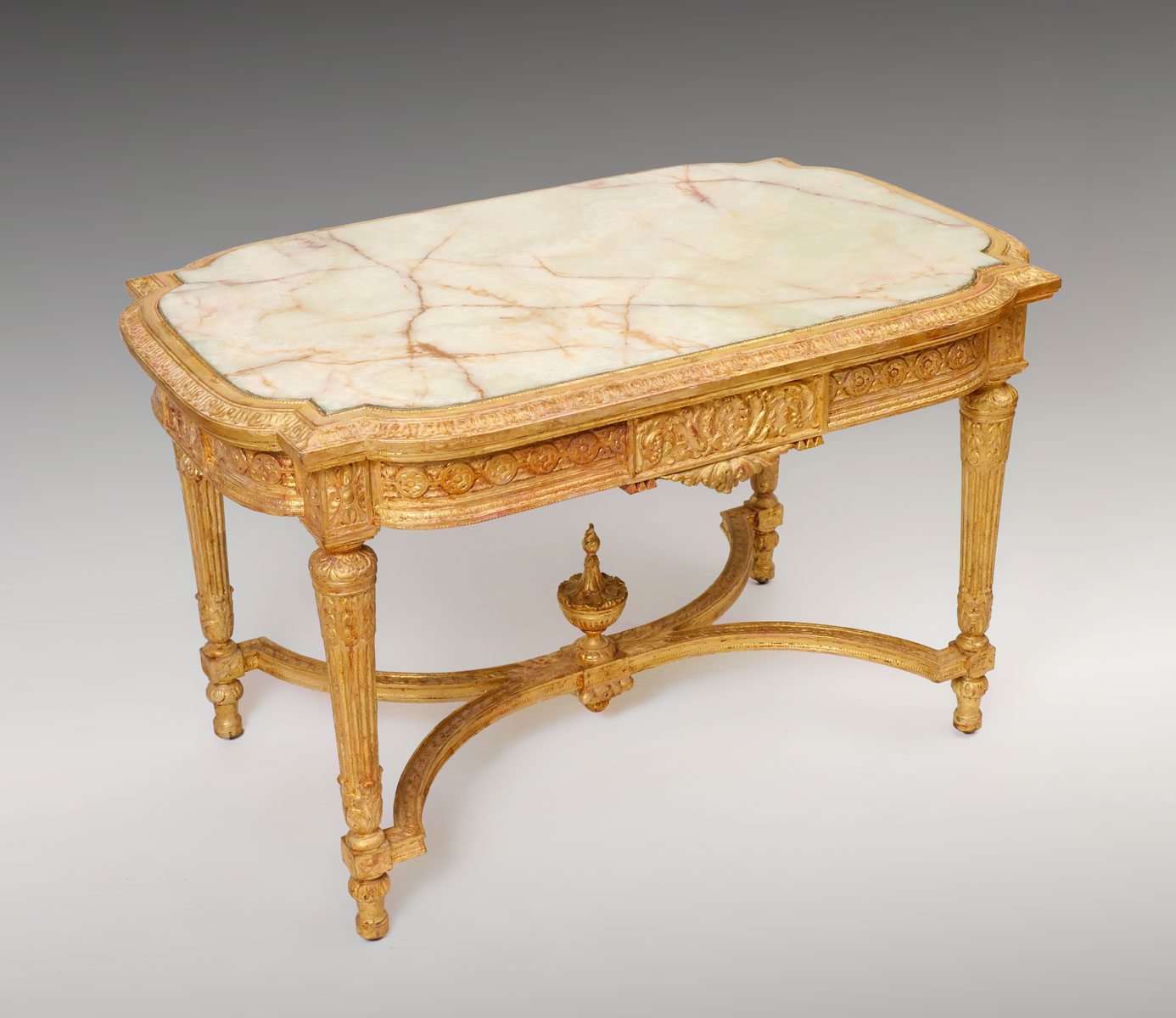 Appraisal: CARVED GILT FRENCH ONYX TOP CONSOLE TABLE Onyx top Gilt