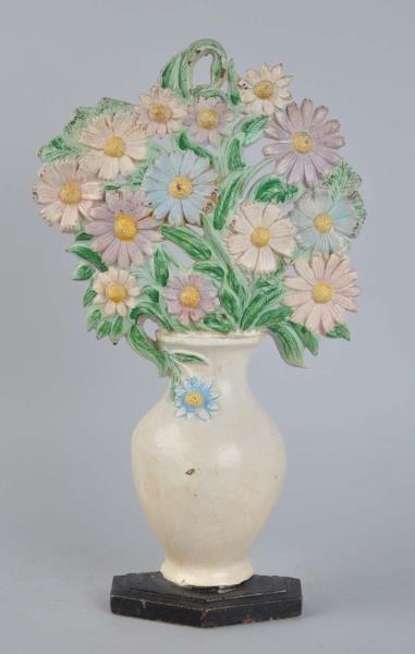 Appraisal: Cast Iron Cosmos in Vase Doorstop Largest flower in vase